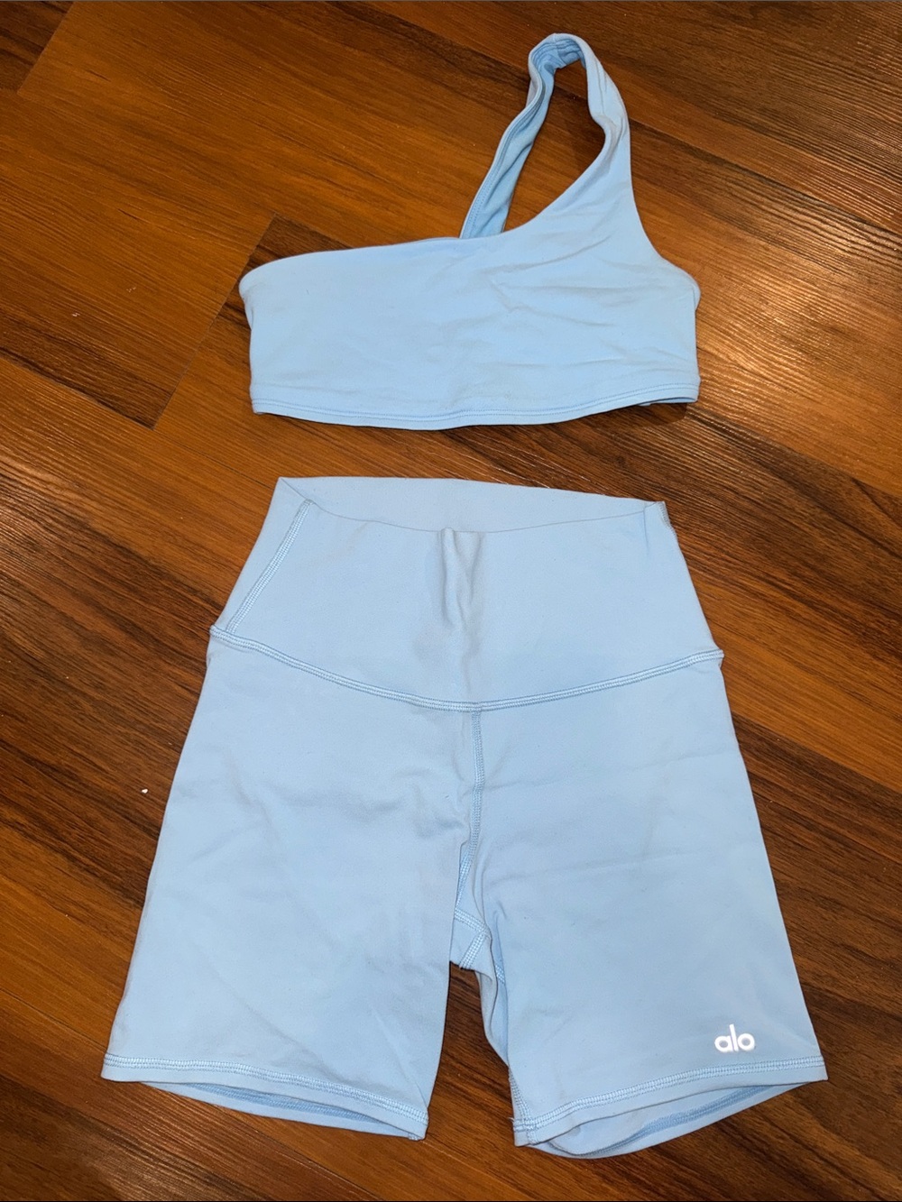 ALO Yoga Light Blue High-Rise Bike Shorts with Matching One-Shoulder Top